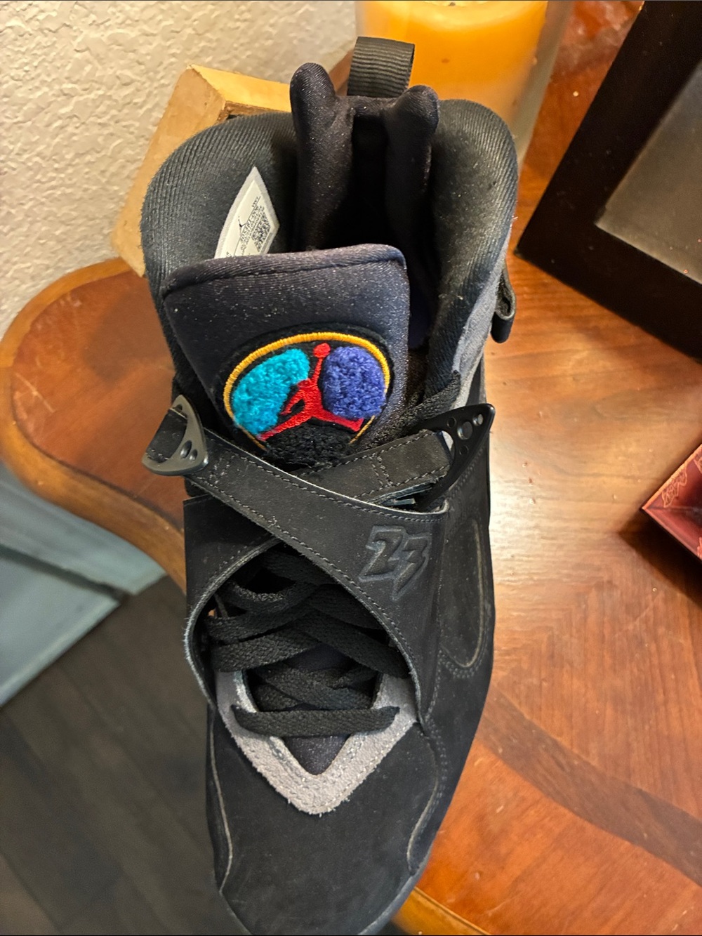 Jordan Men's Black High-Top Sneakers with Teal & Purple Logo Accent - Picture 1 of 4